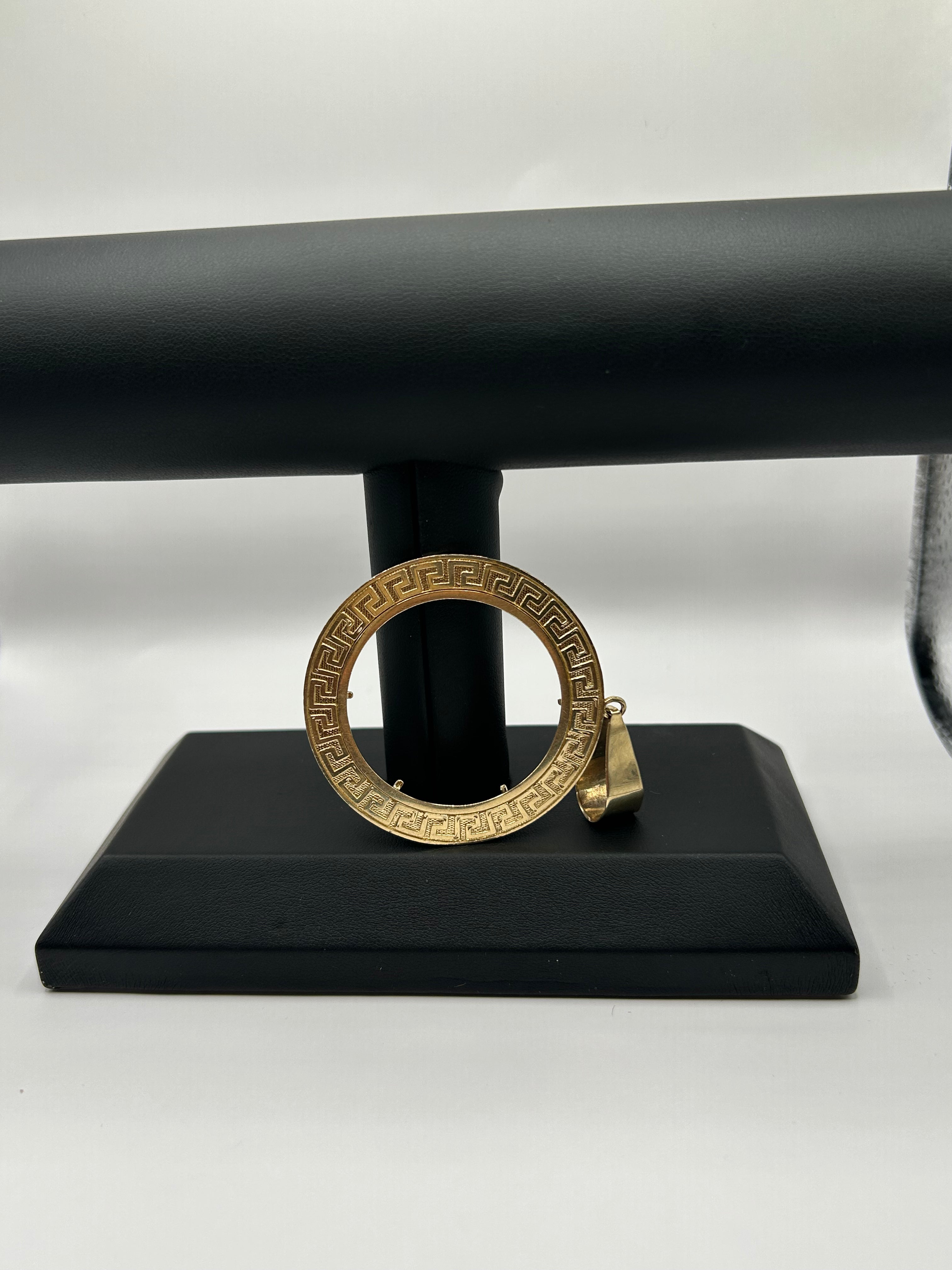 14k Gold Versace bezel 11grams